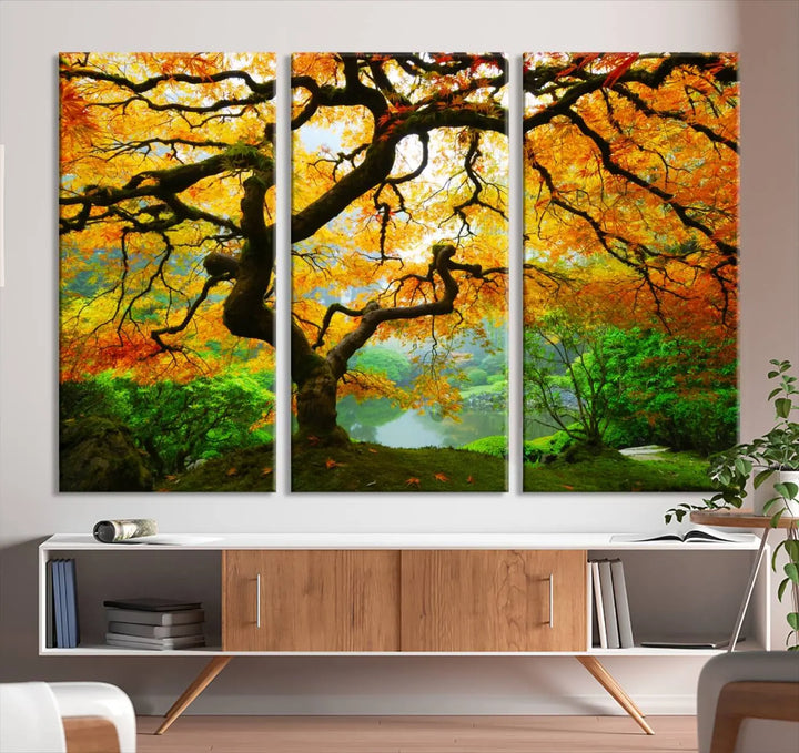 A breathtaking three-panel artwork titled "Japanese Maple in Autumn, Japanese Garden, Portland Oregon Fall Wall Art Canvas Print" adorns the modern living room. Printed on museum-quality canvas with a UV-protective coating for enduring brilliance, this masterpiece comes with free shipping.