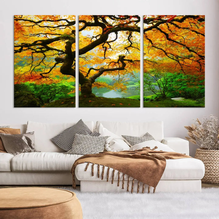 A breathtaking three-panel artwork titled "Japanese Maple in Autumn, Japanese Garden, Portland Oregon Fall Wall Art Canvas Print" adorns the modern living room. Printed on museum-quality canvas with a UV-protective coating for enduring brilliance, this masterpiece comes with free shipping.