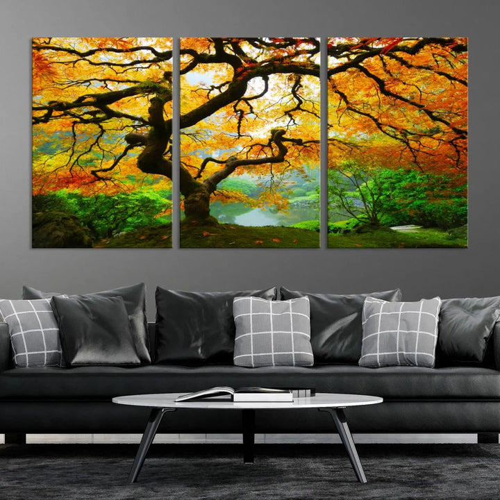 A breathtaking three-panel artwork titled "Japanese Maple in Autumn, Japanese Garden, Portland Oregon Fall Wall Art Canvas Print" adorns the modern living room. Printed on museum-quality canvas with a UV-protective coating for enduring brilliance, this masterpiece comes with free shipping.