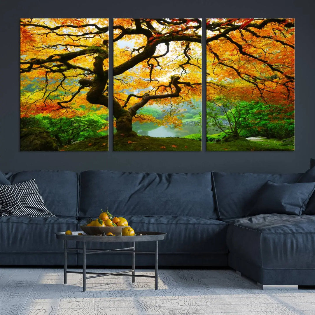 A breathtaking three-panel artwork titled "Japanese Maple in Autumn, Japanese Garden, Portland Oregon Fall Wall Art Canvas Print" adorns the modern living room. Printed on museum-quality canvas with a UV-protective coating for enduring brilliance, this masterpiece comes with free shipping.