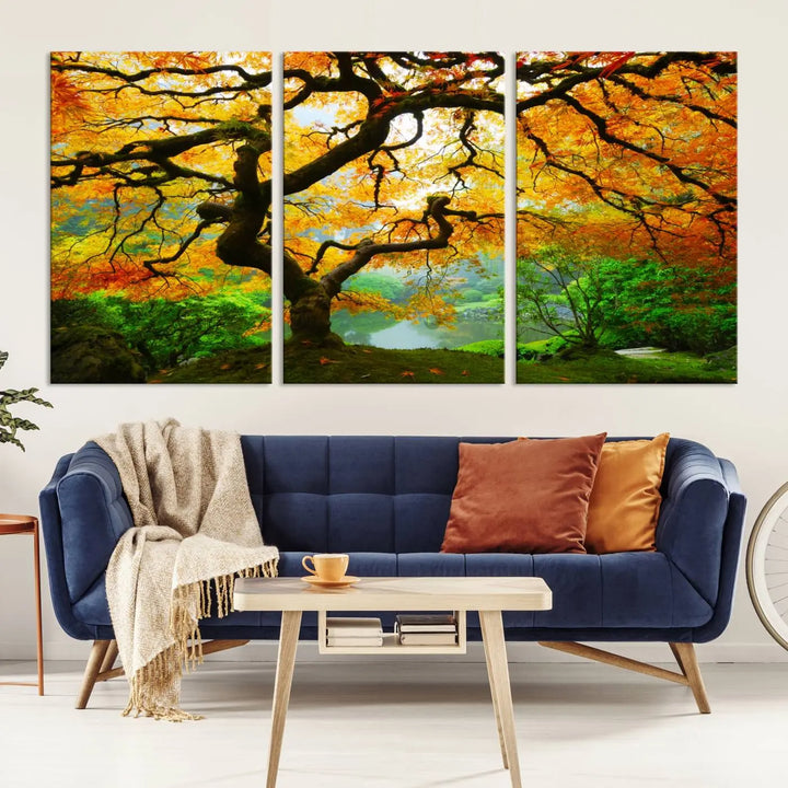 A breathtaking three-panel artwork titled "Japanese Maple in Autumn, Japanese Garden, Portland Oregon Fall Wall Art Canvas Print" adorns the modern living room. Printed on museum-quality canvas with a UV-protective coating for enduring brilliance, this masterpiece comes with free shipping.