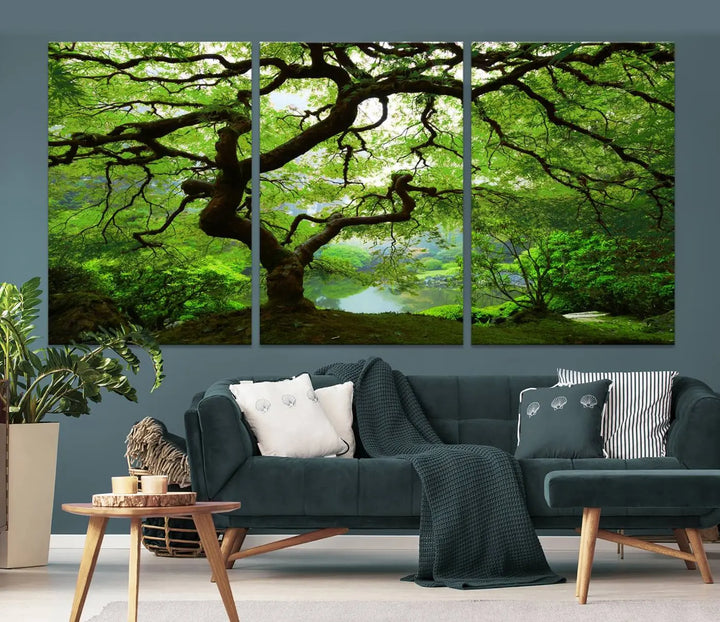 The living room showcases a three-panel artwork titled "Japanese Maple in Autumn, Japanese Garden, Portland Oregon Wall Art" on museum-quality polycotton canvas with a UV-protective coating for lasting brilliance.