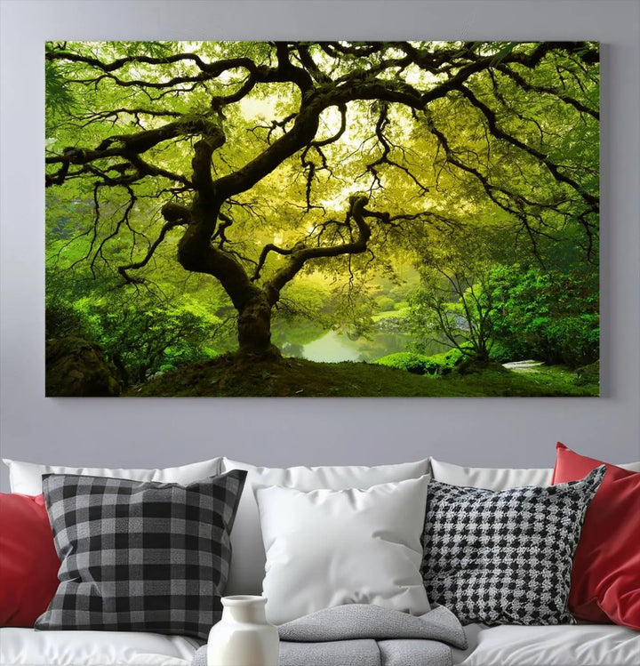 The triptych artwork titled "Japanese Maple in Japanese Garden, Portland Oregon" features lush green foliage and is crafted on museum-quality canvas, ready to hang in a well-lit room.