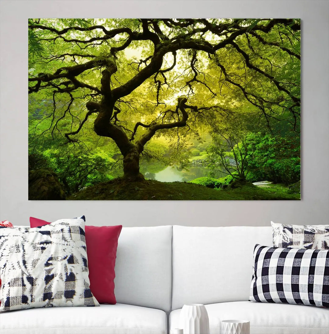 The triptych artwork titled "Japanese Maple in Japanese Garden, Portland Oregon" features lush green foliage and is crafted on museum-quality canvas, ready to hang in a well-lit room.