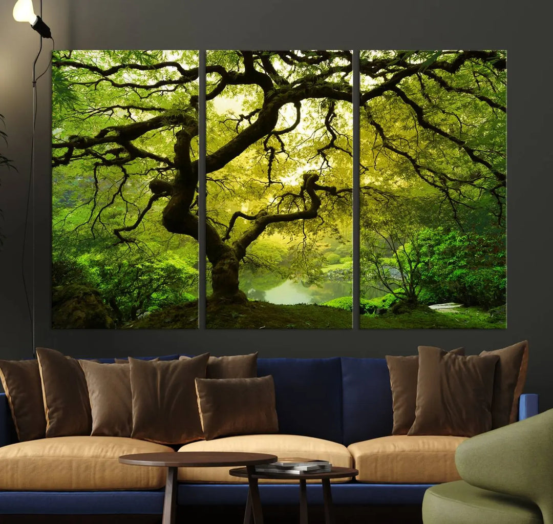 The triptych artwork titled "Japanese Maple in Japanese Garden, Portland Oregon" features lush green foliage and is crafted on museum-quality canvas, ready to hang in a well-lit room.