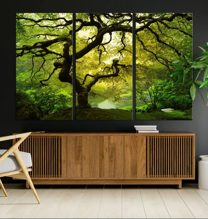 The triptych artwork titled "Japanese Maple in Japanese Garden, Portland Oregon" features lush green foliage and is crafted on museum-quality canvas, ready to hang in a well-lit room.