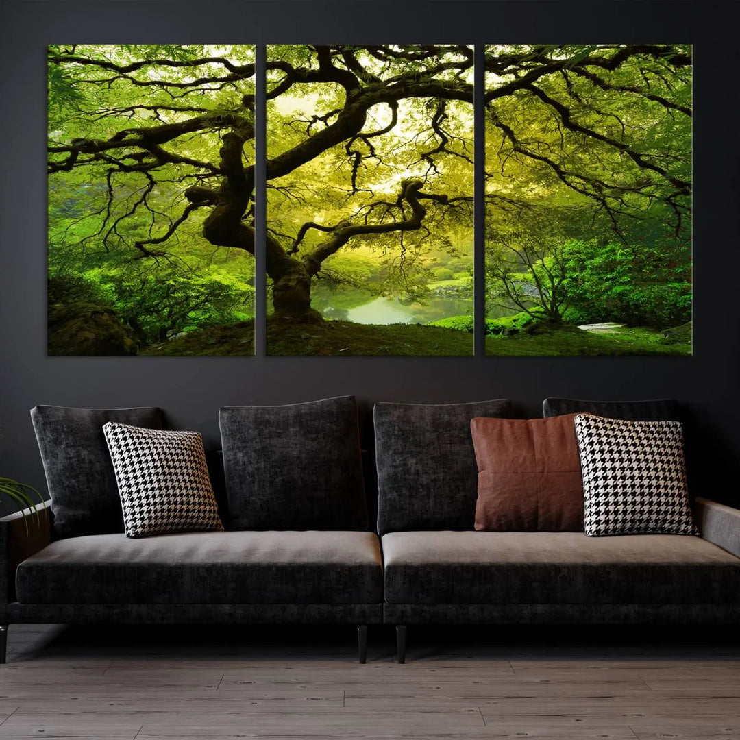 The triptych artwork titled "Japanese Maple in Japanese Garden, Portland Oregon" features lush green foliage and is crafted on museum-quality canvas, ready to hang in a well-lit room.