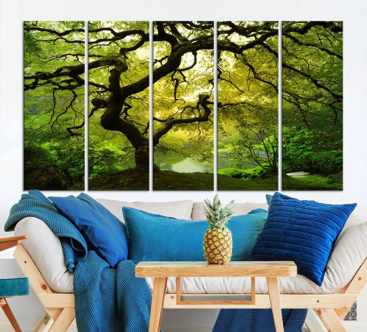 The triptych artwork titled "Japanese Maple in Japanese Garden, Portland Oregon" features lush green foliage and is crafted on museum-quality canvas, ready to hang in a well-lit room.