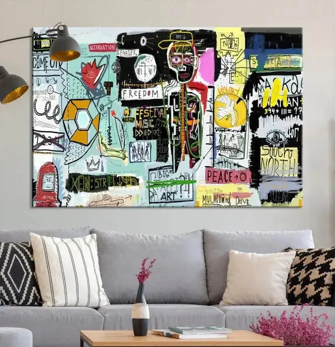 The Jean Abstract Graffiti Canvas, a modern abstract wall art inspired by street art and featuring vibrant symbols and text, is elegantly displayed in the living room.