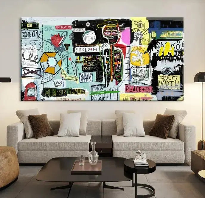 The Jean Abstract Graffiti Canvas, a modern abstract wall art inspired by street art and featuring vibrant symbols and text, is elegantly displayed in the living room.