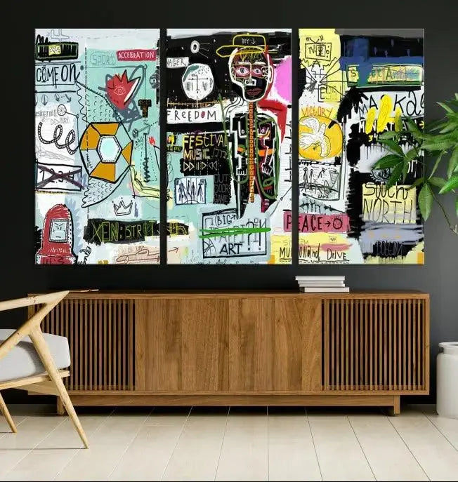 The Jean Abstract Graffiti Canvas, a modern abstract wall art inspired by street art and featuring vibrant symbols and text, is elegantly displayed in the living room.