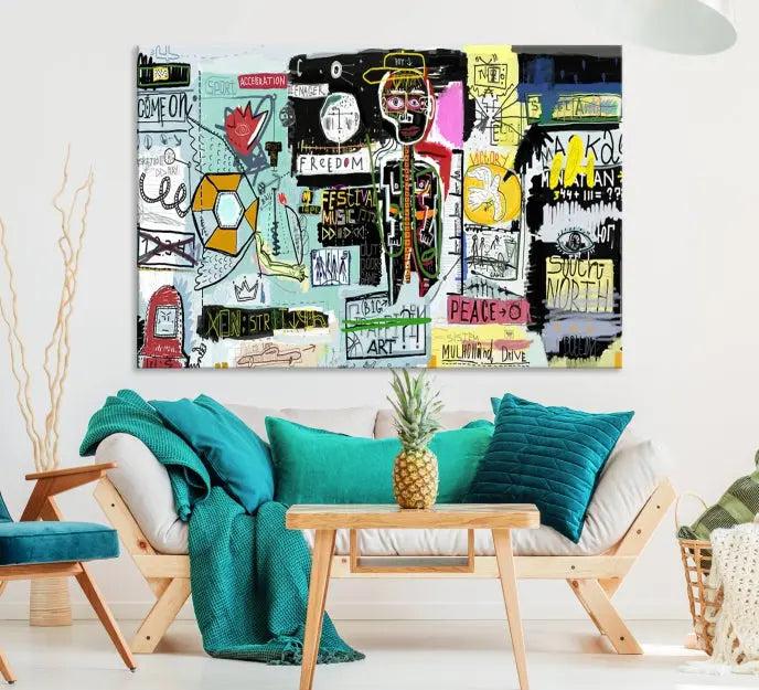 The Jean Abstract Graffiti Canvas, a modern abstract wall art inspired by street art and featuring vibrant symbols and text, is elegantly displayed in the living room.