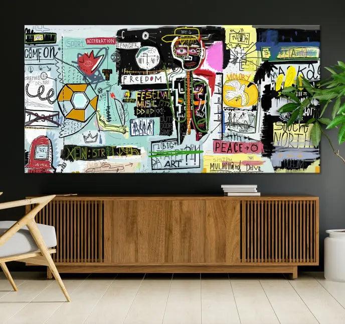 The Jean Abstract Graffiti Canvas, a modern abstract wall art inspired by street art and featuring vibrant symbols and text, is elegantly displayed in the living room.