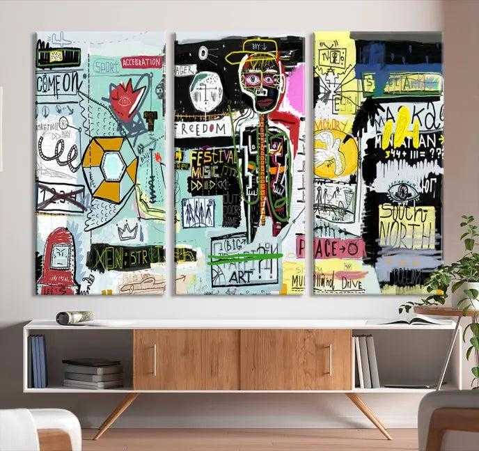 The Jean Abstract Graffiti Canvas, a modern abstract wall art inspired by street art and featuring vibrant symbols and text, is elegantly displayed in the living room.