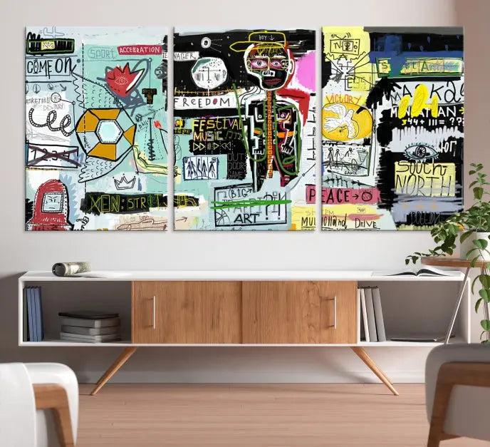 The Jean Abstract Graffiti Canvas, a modern abstract wall art inspired by street art and featuring vibrant symbols and text, is elegantly displayed in the living room.