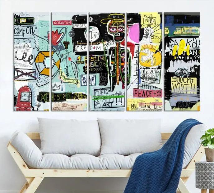 The Jean Abstract Graffiti Canvas, a modern abstract wall art inspired by street art and featuring vibrant symbols and text, is elegantly displayed in the living room.