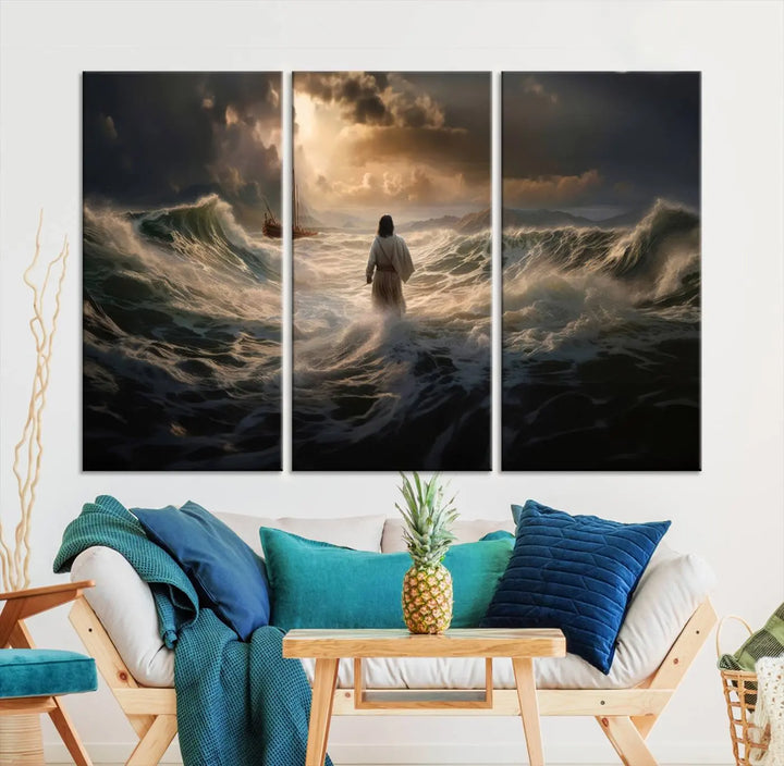 The Jesus Walking on Water Wall Art Canvas Print, a triptych mural featuring Jesus traversing turbulent waves with a distant boat under a dramatic sky, embodies spiritual art and religious decor. It inspires reflection and tranquility in the space.