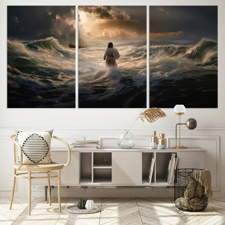 The Jesus Walking on Water Wall Art Canvas Print, a triptych mural featuring Jesus traversing turbulent waves with a distant boat under a dramatic sky, embodies spiritual art and religious decor. It inspires reflection and tranquility in the space.