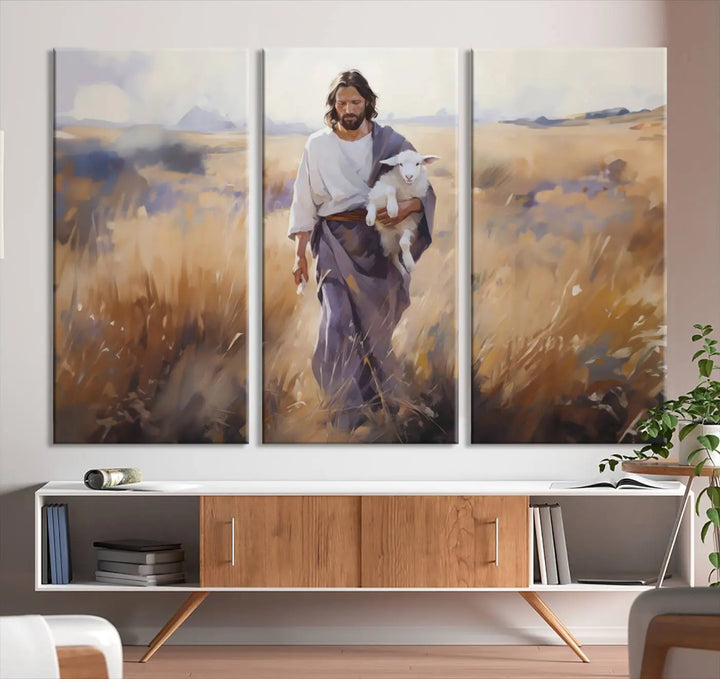 Introducing the Jesus the Good Shepherd Wall Art Canvas Print - Lost Lamb: a captivating triptych depicting a robed man holding a lamb in a radiant golden field. This elegant piece is perfect for adding a touch of traditional Christian decor to your living space, seamlessly blending faith with contemporary style.