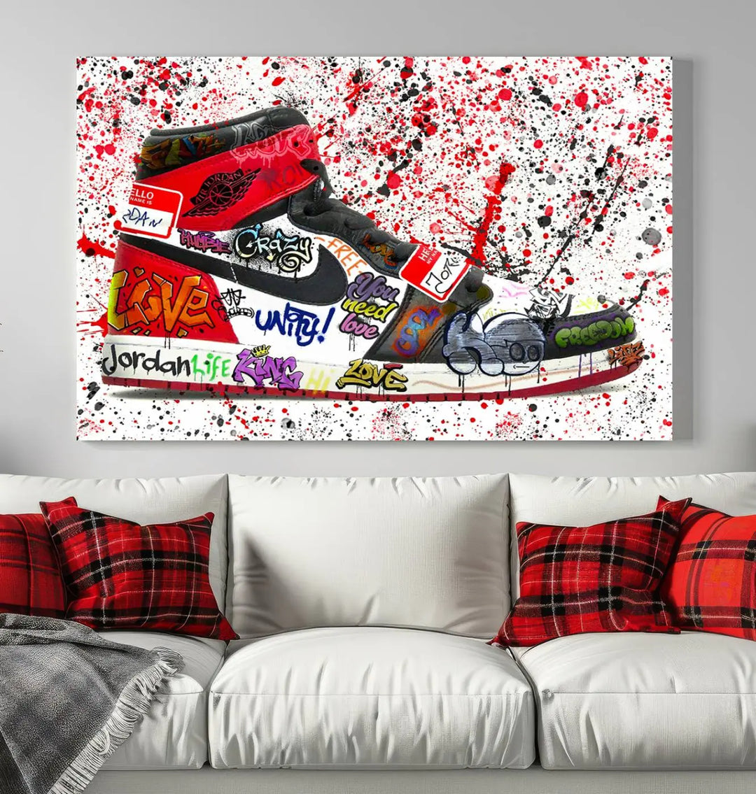 A large triptych mural titled "Jordan Shoes Graffiti Wall Art Canvas Print - Jordan Graffiti Canvas Wall Art" features images of Jordan Shoes against a splattered paint background that resembles graffiti, making it an ideal choice for sneakerheads and urban art lovers.