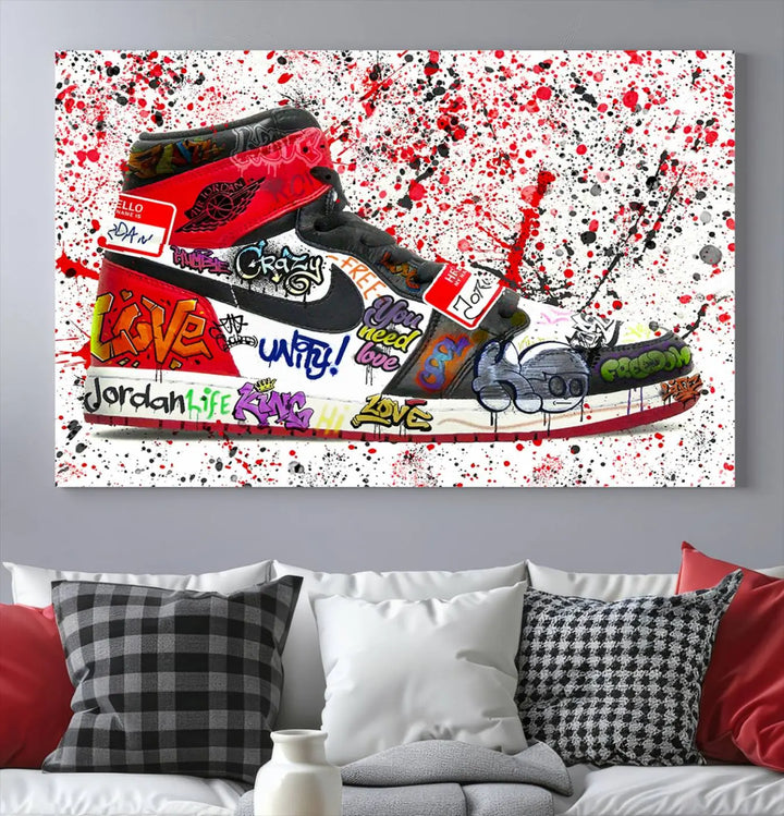 A large triptych mural titled "Jordan Shoes Graffiti Wall Art Canvas Print - Jordan Graffiti Canvas Wall Art" features images of Jordan Shoes against a splattered paint background that resembles graffiti, making it an ideal choice for sneakerheads and urban art lovers.