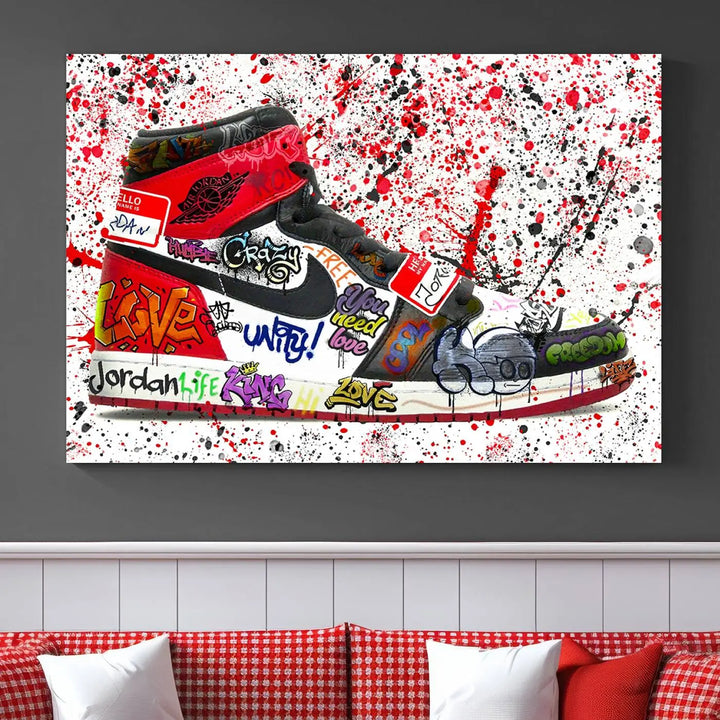 A large triptych mural titled "Jordan Shoes Graffiti Wall Art Canvas Print - Jordan Graffiti Canvas Wall Art" features images of Jordan Shoes against a splattered paint background that resembles graffiti, making it an ideal choice for sneakerheads and urban art lovers.