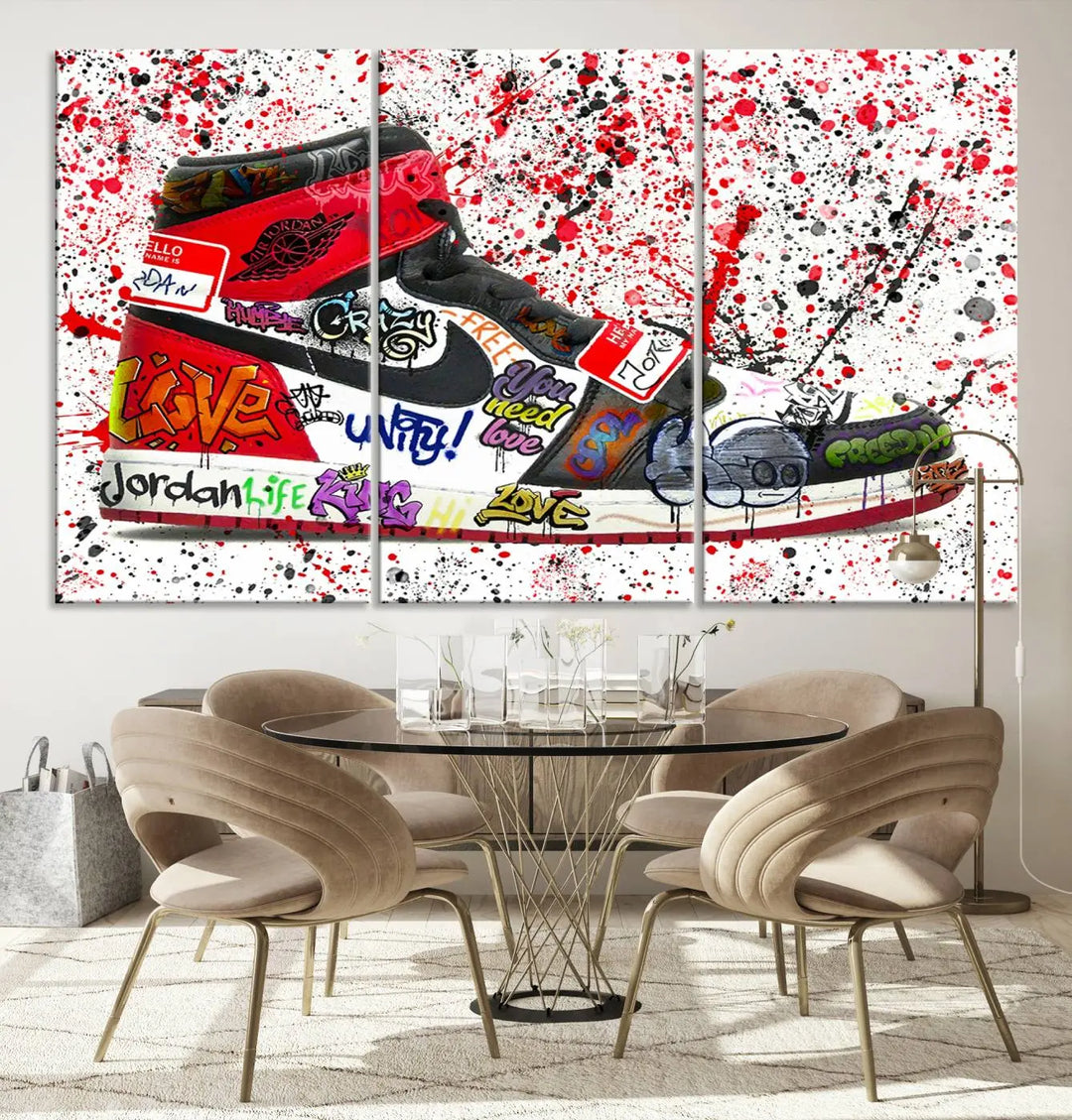 A large triptych mural titled "Jordan Shoes Graffiti Wall Art Canvas Print - Jordan Graffiti Canvas Wall Art" features images of Jordan Shoes against a splattered paint background that resembles graffiti, making it an ideal choice for sneakerheads and urban art lovers.