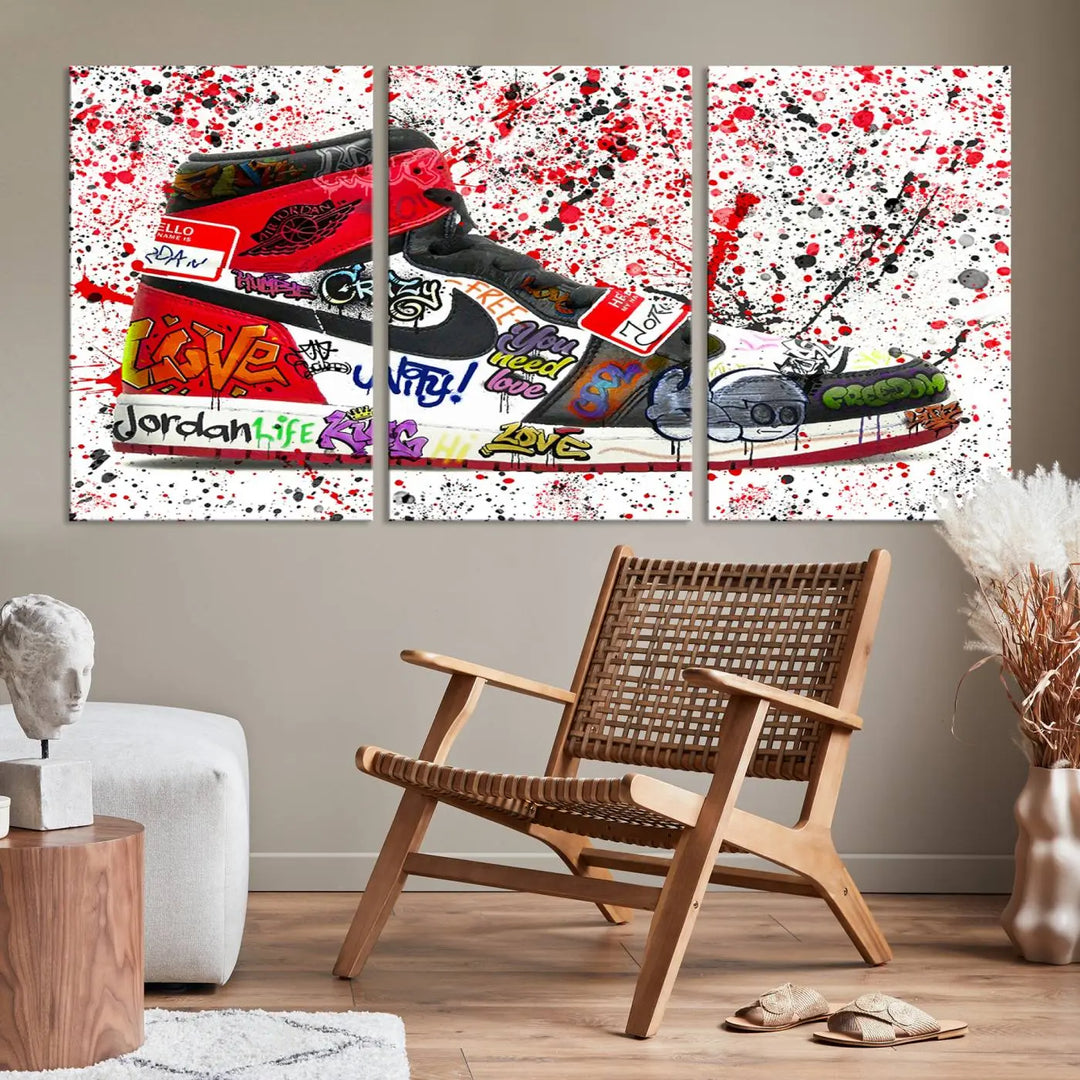 A large triptych mural titled "Jordan Shoes Graffiti Wall Art Canvas Print - Jordan Graffiti Canvas Wall Art" features images of Jordan Shoes against a splattered paint background that resembles graffiti, making it an ideal choice for sneakerheads and urban art lovers.