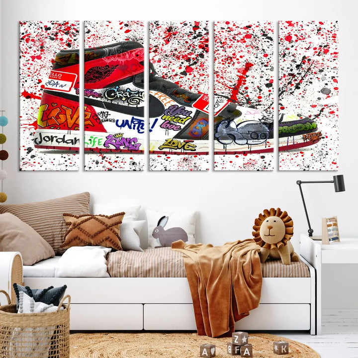 A large triptych mural titled "Jordan Shoes Graffiti Wall Art Canvas Print - Jordan Graffiti Canvas Wall Art" features images of Jordan Shoes against a splattered paint background that resembles graffiti, making it an ideal choice for sneakerheads and urban art lovers.