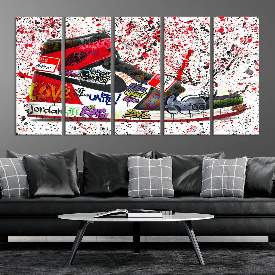 A large triptych mural titled "Jordan Shoes Graffiti Wall Art Canvas Print - Jordan Graffiti Canvas Wall Art" features images of Jordan Shoes against a splattered paint background that resembles graffiti, making it an ideal choice for sneakerheads and urban art lovers.