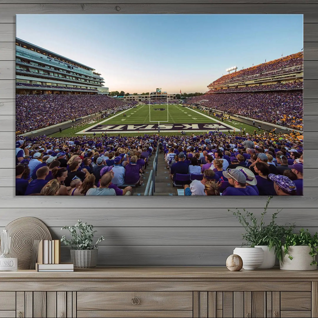 The Kansas State University Wildcats Football Team Print - Manhattan Bill Snyder Family Football Stadium Wall Art Canvas Print brings a lively depiction of a packed football stadium to life, offering a gallery-quality finish.