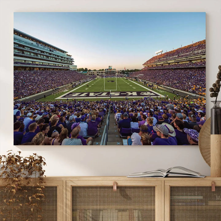 The Kansas State University Wildcats Football Team Print - Manhattan Bill Snyder Family Football Stadium Wall Art Canvas Print brings a lively depiction of a packed football stadium to life, offering a gallery-quality finish.