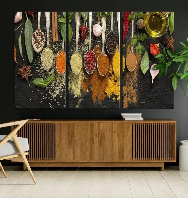 The Kitchen Spice Wall Art Canvas Print is a triptych set, gallery wrapped for sophistication, featuring various spices and herbs on spoons. Made with museum-quality polycotton and completed with a UV-protective coating, it ensures enduring vibrancy and allure.