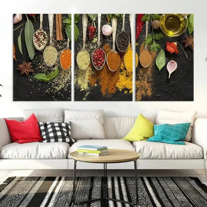 The Kitchen Spice Wall Art Canvas Print is a triptych set, gallery wrapped for sophistication, featuring various spices and herbs on spoons. Made with museum-quality polycotton and completed with a UV-protective coating, it ensures enduring vibrancy and allure.