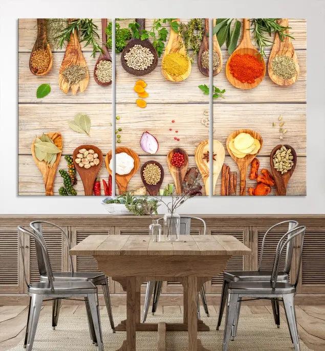 The Kitchen Spice on the Table Wall Art Canvas Print features a triptych of wooden spoons with an array of spices and herbs, artfully presented on a wooden background. Printed on museum-quality canvas, it guarantees lasting elegance and durability.