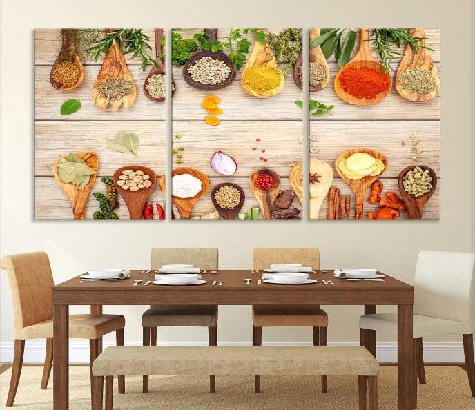 The Kitchen Spice on the Table Wall Art Canvas Print features a triptych of wooden spoons with an array of spices and herbs, artfully presented on a wooden background. Printed on museum-quality canvas, it guarantees lasting elegance and durability.