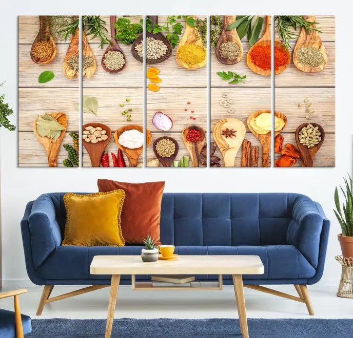 The Kitchen Spice on the Table Wall Art Canvas Print features a triptych of wooden spoons with an array of spices and herbs, artfully presented on a wooden background. Printed on museum-quality canvas, it guarantees lasting elegance and durability.