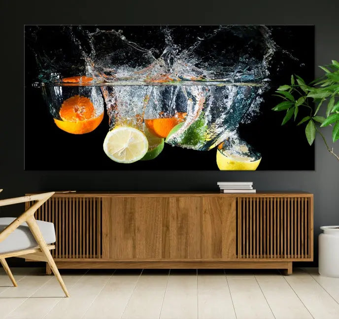 The room features the Kitchen Wall Art Fruits Art Canvas Print on the wall. This three-panel artwork is crafted on museum-quality canvas with vivid colors preserved by a UV-protective coating, ensuring lasting vibrancy.