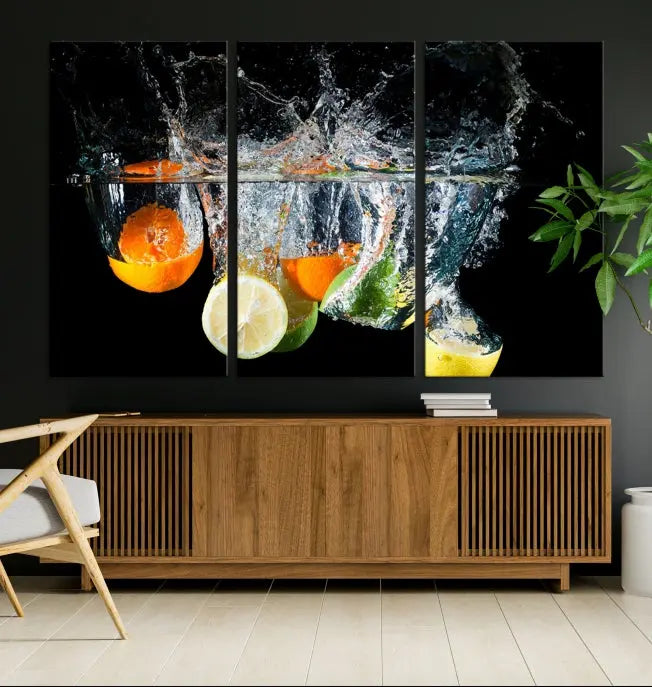 The room features the Kitchen Wall Art Fruits Art Canvas Print on the wall. This three-panel artwork is crafted on museum-quality canvas with vivid colors preserved by a UV-protective coating, ensuring lasting vibrancy.