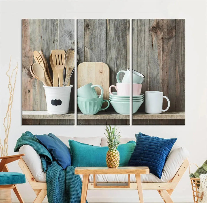 The "Kitchenware on Rustic Woods Canvas" features a triptych of kitchen utensils and cups. This piece evokes artistry reminiscent of museum-quality canvases, with each detail appearing as if handcrafted in the USA.