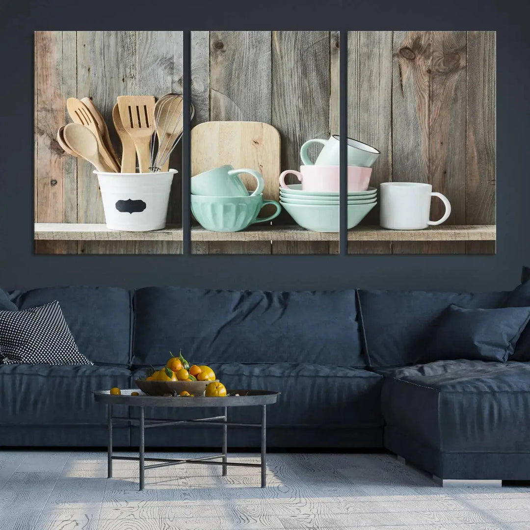 The "Kitchenware on Rustic Woods Canvas" features a triptych of kitchen utensils and cups. This piece evokes artistry reminiscent of museum-quality canvases, with each detail appearing as if handcrafted in the USA.