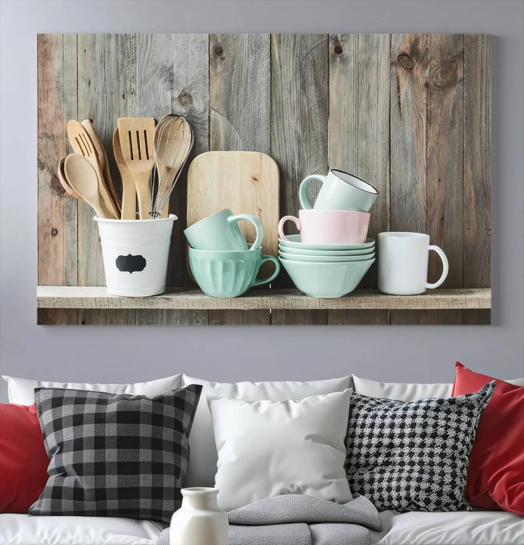 The "Kitchenware on Rustic Woods Canvas" features a triptych of kitchen utensils and cups. This piece evokes artistry reminiscent of museum-quality canvases, with each detail appearing as if handcrafted in the USA.