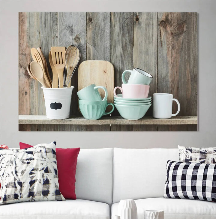 The "Kitchenware on Rustic Woods Canvas" features a triptych of kitchen utensils and cups. This piece evokes artistry reminiscent of museum-quality canvases, with each detail appearing as if handcrafted in the USA.