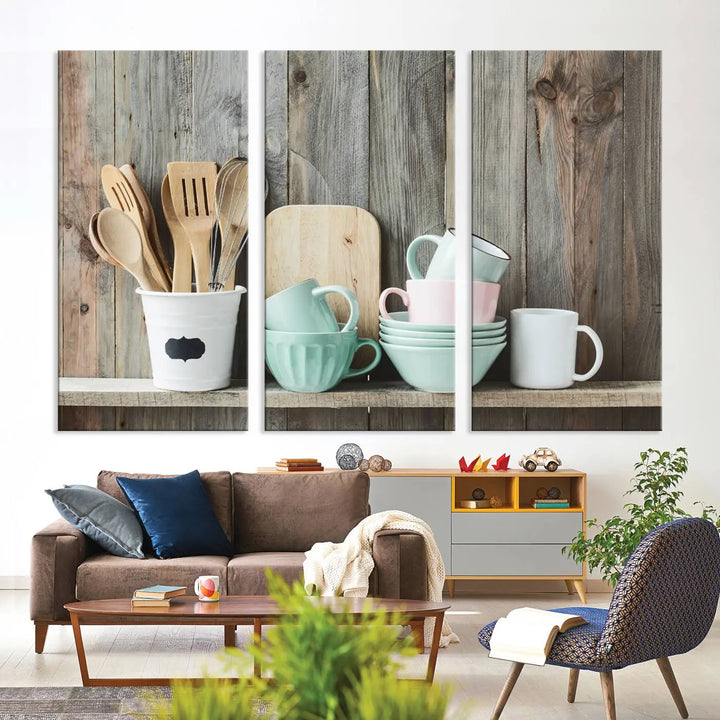 The "Kitchenware on Rustic Woods Canvas" features a triptych of kitchen utensils and cups. This piece evokes artistry reminiscent of museum-quality canvases, with each detail appearing as if handcrafted in the USA.