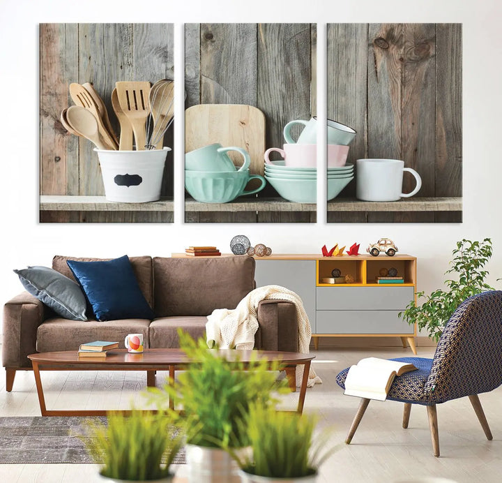 The "Kitchenware on Rustic Woods Canvas" features a triptych of kitchen utensils and cups. This piece evokes artistry reminiscent of museum-quality canvases, with each detail appearing as if handcrafted in the USA.