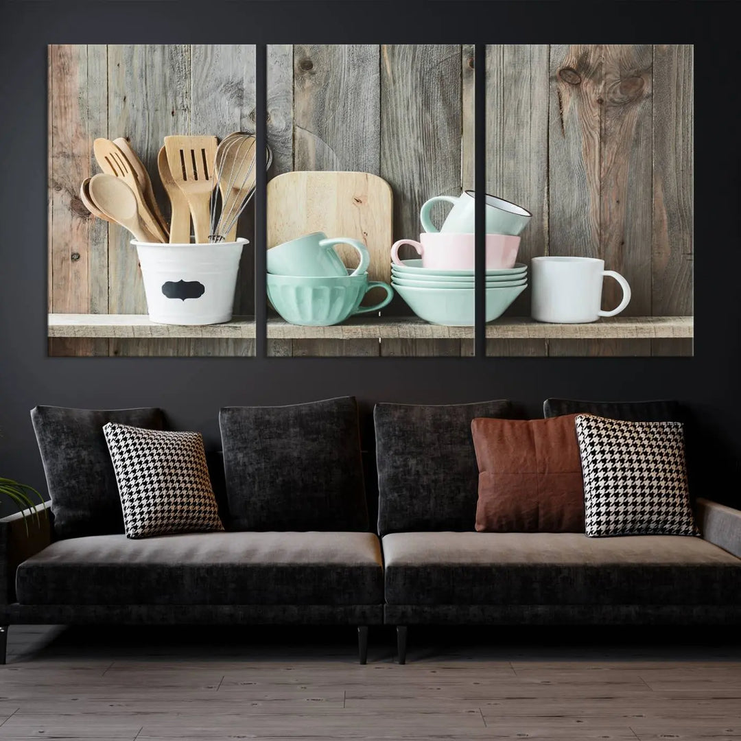 The "Kitchenware on Rustic Woods Canvas" features a triptych of kitchen utensils and cups. This piece evokes artistry reminiscent of museum-quality canvases, with each detail appearing as if handcrafted in the USA.