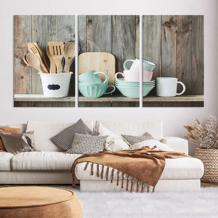 The "Kitchenware on Rustic Woods Canvas" features a triptych of kitchen utensils and cups. This piece evokes artistry reminiscent of museum-quality canvases, with each detail appearing as if handcrafted in the USA.