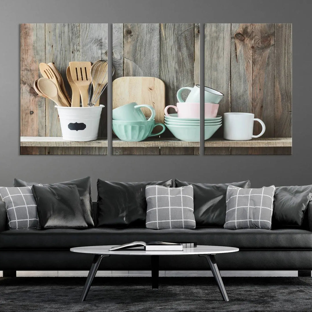 The "Kitchenware on Rustic Woods Canvas" features a triptych of kitchen utensils and cups. This piece evokes artistry reminiscent of museum-quality canvases, with each detail appearing as if handcrafted in the USA.