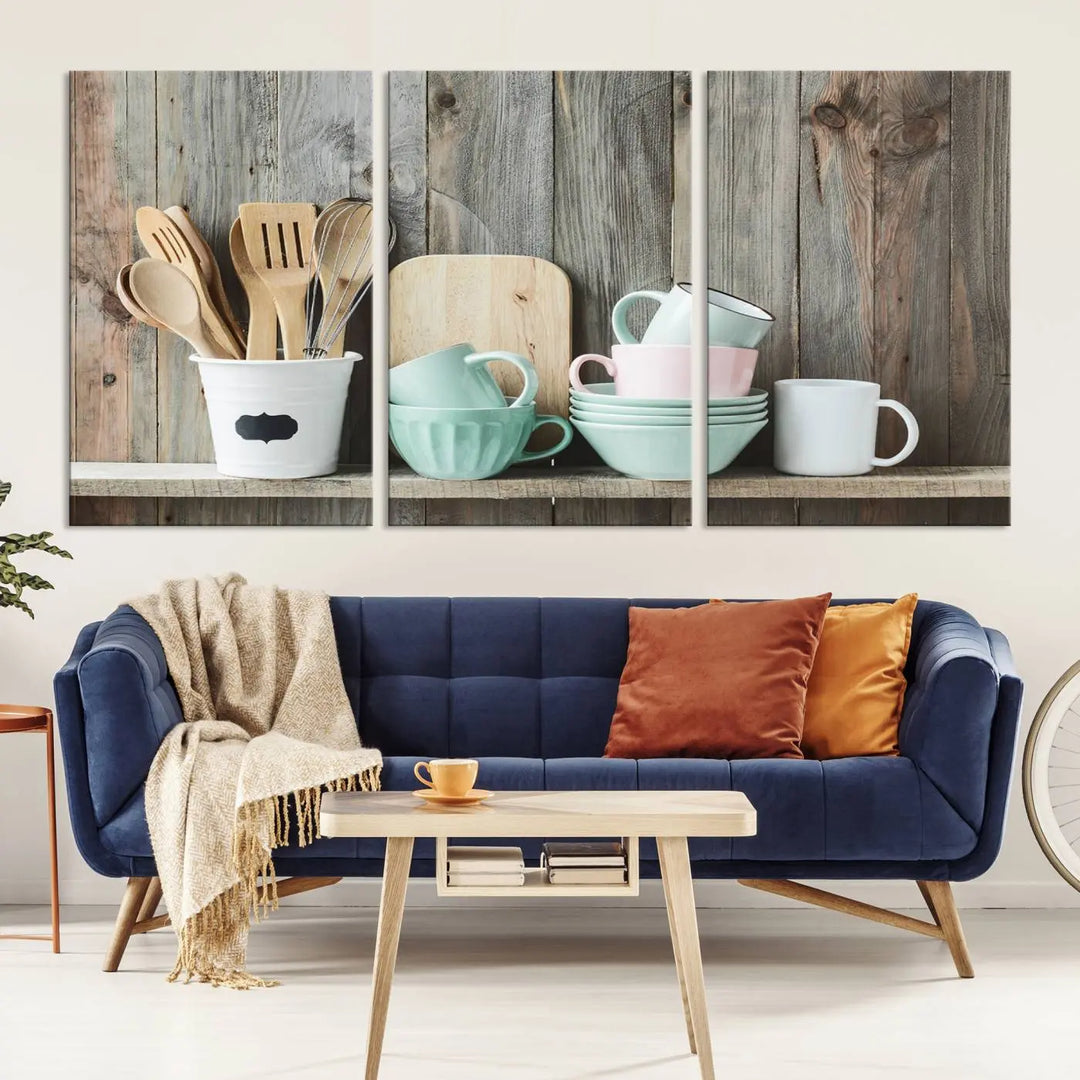 The "Kitchenware on Rustic Woods Canvas" features a triptych of kitchen utensils and cups. This piece evokes artistry reminiscent of museum-quality canvases, with each detail appearing as if handcrafted in the USA.