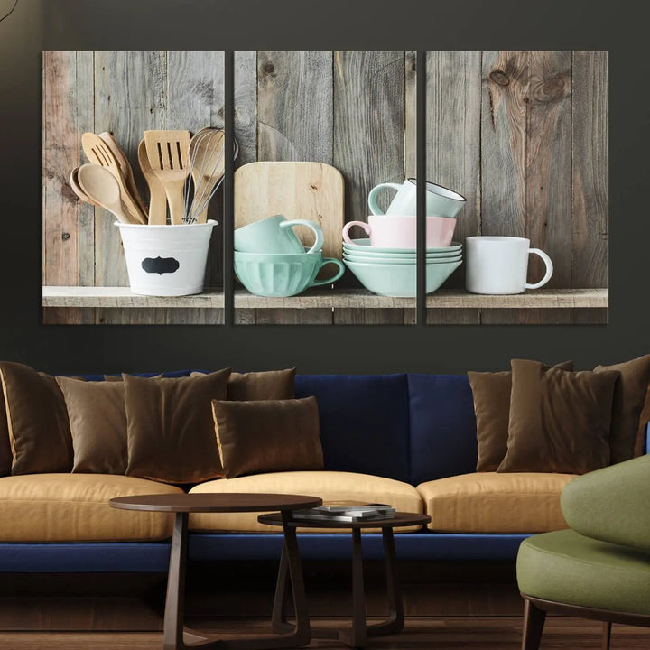 The "Kitchenware on Rustic Woods Canvas" features a triptych of kitchen utensils and cups. This piece evokes artistry reminiscent of museum-quality canvases, with each detail appearing as if handcrafted in the USA.